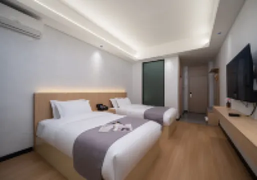 Yuanmou Yuepan Pearl Hotel (Yuanmou Central Bus Station) - ที่มีที่จอดรถ