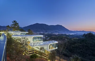 Yunshang Xingkong Hotel Отели в г. Цзиндэ
