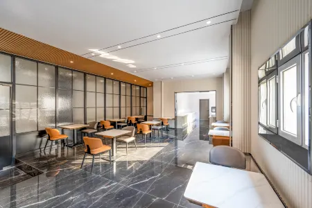 Magnotel Business (Tianjin Eye Store at Tianjin Station) Отели рядом с достопримечательностью «Dabei Temple»