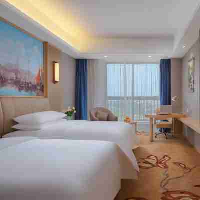 維也納國際酒店(蒙城新中醫院萬達廣場店) Rooms