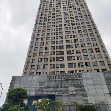 Jinjiang Baolong Plaza B&B