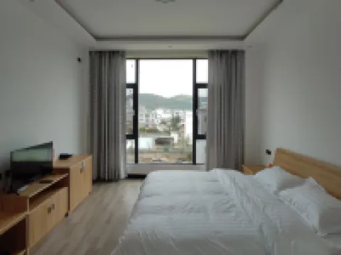 Luoping Chunri Xiaoyuan Homestay (Jinji Peak Cong Branch) فنادق في لوى بينغ