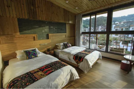 Mojiang Xile Inn Отели в г. Моцзян