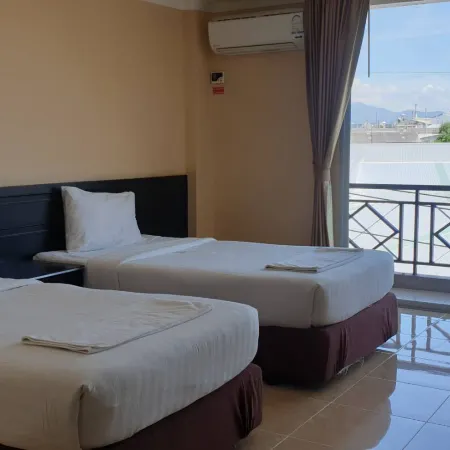 J&Y Lodge Hotel Отели рядом с достопримечательностью «Замок Амата»