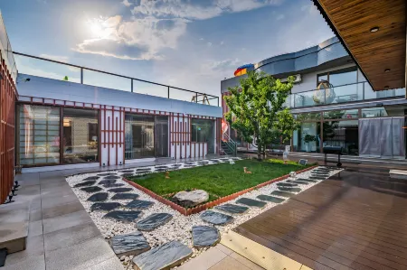 Floral Hotel·Beijing Expo Park,Yake Leisure Hotel Отели рядом с достопримечательностью «Guishui Park»