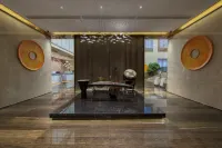 Maison New Century Hotel