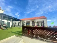 Zhangzi Island Gaojia Resort Inn - acceptant les animaux