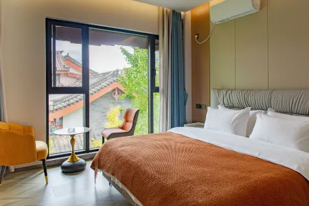 Chuxiong Qile Homestay (Yi Ancient Town) Отели в г. Чусион