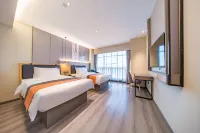 頤尚酒店（樂山高鐵站世豪廣場店） 鄰近西岸第一城小區運動場的酒店