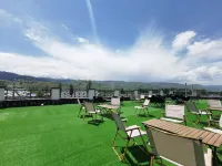 Guyue Chinoiserie Homestay Hotels in Кюнес