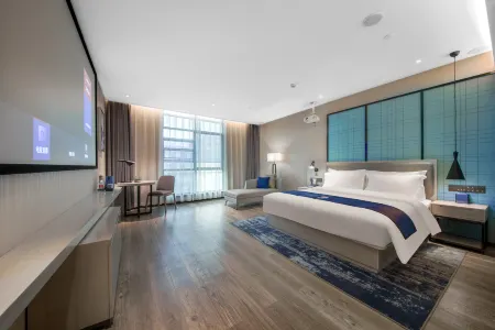 Echarm Hotel (Zhongxiang Railway Station Mochou Lake Road) Отели рядом с достопримечательностью «Xianling Mausoleum»