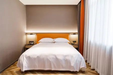 Nanshan  Holiday Hotel(Taihe Community Store) Отели рядом с достопримечательностью «Jingye Temple (Southwest Gate)»