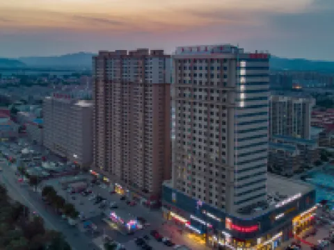 YiYueShangHe Hotel (Linqu Quanfu yuan Zhongbai building shop Hoteles en Condado de Linqu