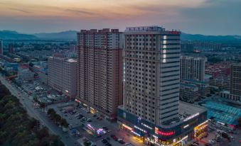 YiYueShangHe Hotel (Linqu Quanfu yuan Zhongbai building shop