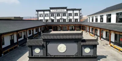 jiulianchengguzhenminsu Hotel di 