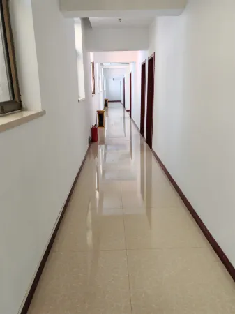 Xingyuan Express Hotel Отели в г. Дайсянь