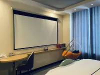 Yunduo Art Hotel (Urumqi High Speed Railway Station Baoneng City ) - جاكوزي
