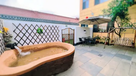 Longhua Lefu Elegant Restaurant Hot Spring Homestay Отели в г. Лунхуа