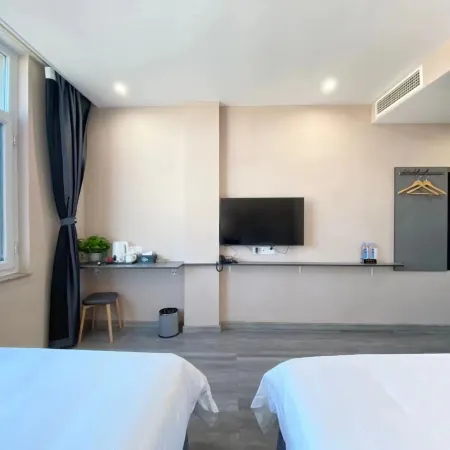 Qixia Xiangange Business Hotel