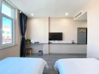 Qixia Xiangange Business Hotel