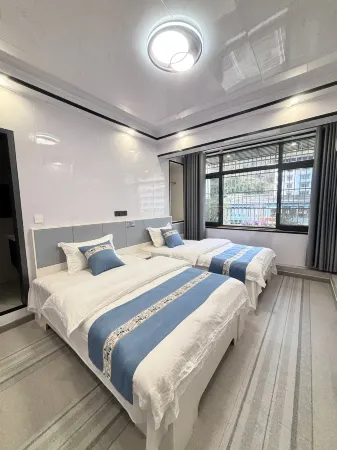 Daozhen Sunshine Tribes Apartment Отели в г. Даочжэнь