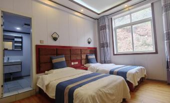 Bianba Huadu Business Hotel