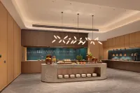 Hilton Garden Inn Maoming Xinyi - Morgenmad