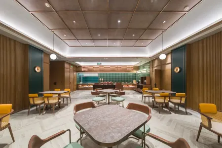 Orange Hotel (Tengzhou Longquan Road) Отели рядом с достопримечательностью «Tengzhoushi Shimin Park»