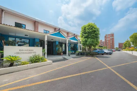 Kuan ju yun jian garden hotel Отели рядом с достопримечательностью «Shanghai International Studies University (Wenxiang Road)»