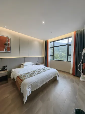 Muli Kangba Hotel Отели рядом с достопримечательностью «Шэнь Гуан Начальная Школа Уезда Мули»