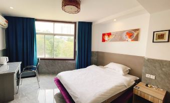 Fashion Business Hotel (Near Shangrao High-speed Railway Station)