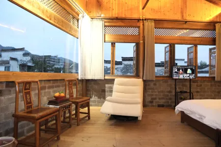 GreenWildCourtyard Отели рядом с достопримечательностью «Fenglehu Scenic Area»