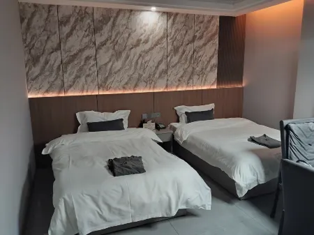 Xinyuan Hot Spring Hotel Отели рядом со станцией Minquan North Railway Station