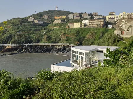 Manxiang·ManYeSheYu Island Resort Hotel Отели рядом с достопримечательностью «Baima'ao»