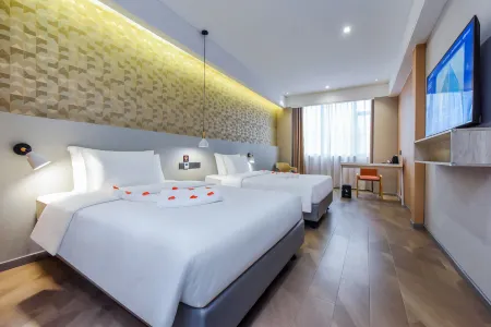 Ximan puls Hotel (Chongqing Jiefangbei shibati store) Отели рядом с достопримечательностью «Chongqing Youth Vocational College»