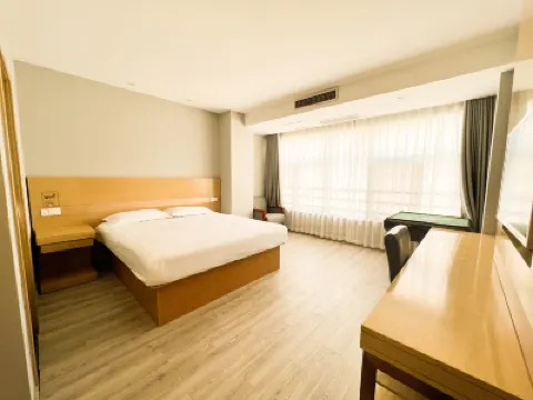 Tongbaiyun Hotel (Suqian Hongzehu East Road Sunshine 100 Shop) Hotels in Suqian