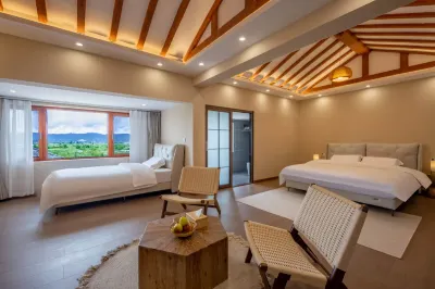 玉龍木府拾光民宿 鄰近麗江拉市海高原濕地省級自然保護區管護局的酒店