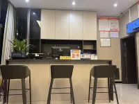 Xinhui Hotel (Meitan Qiushi High School)