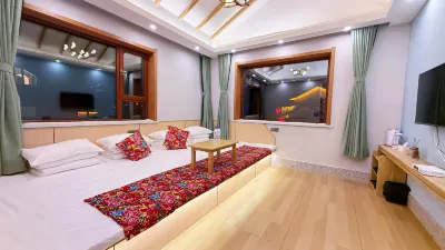 dundunyouni Homestay Отели рядом с достопримечательностью «Xueyun Street»
