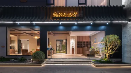 Chuxiong Yushe Meisu Hotel (Yi Ancient Town Branch) Отели рядом с достопримечательностью «Shimin Square»