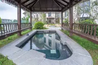 Gangbozhijia Theme Hotel - Pemandian Air Panas