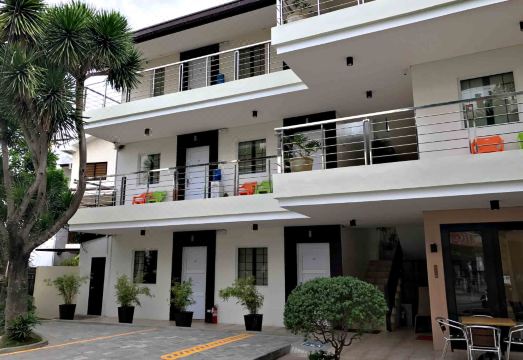 진장 인 보라카이 스테이션 1의 깔끔한 객실 내부