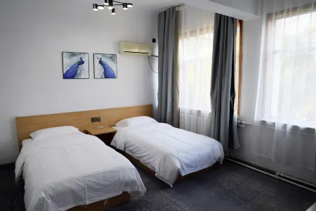 Kunda Hotel (Shizuishan Pedestrian Street) Отели рядом с достопримечательностью «Ningxia Institute of Technology»