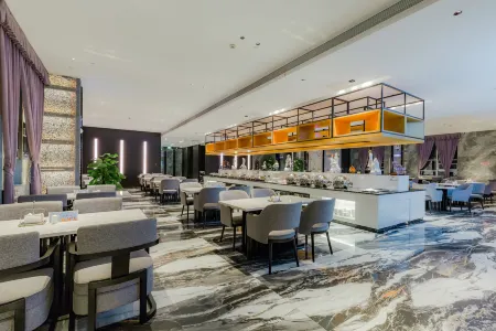 Puerman International Hotel(Dingnan) Отели в г. Динань