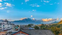 Lijiang ancient city Zangyuan snow mountain view hotel (big water wheel shop) - Bjergudsigt