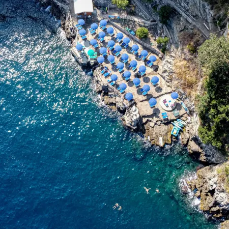 Village Camping Santa Fortunata - Campogaio Отели рядом с достопримечательностью «Пляж Леонеллис»