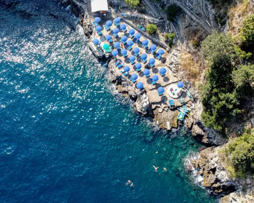 Village Camping Santa Fortunata - Campogaio Отели рядом с достопримечательностью «Пляж Леонеллис»