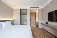 Shangpin Hotel (Paojiang Paodu Road) Отели в г. Зона развития Paojiang
