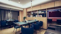 Longkou LanOuShangPin Hotel (Bosshang Shopping Plaza)