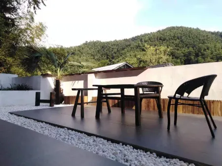 Qingyu Homestay Отели рядом с достопримечательностью «Jiangxi Ming and Qing Ancient Dwelling Expo Park»